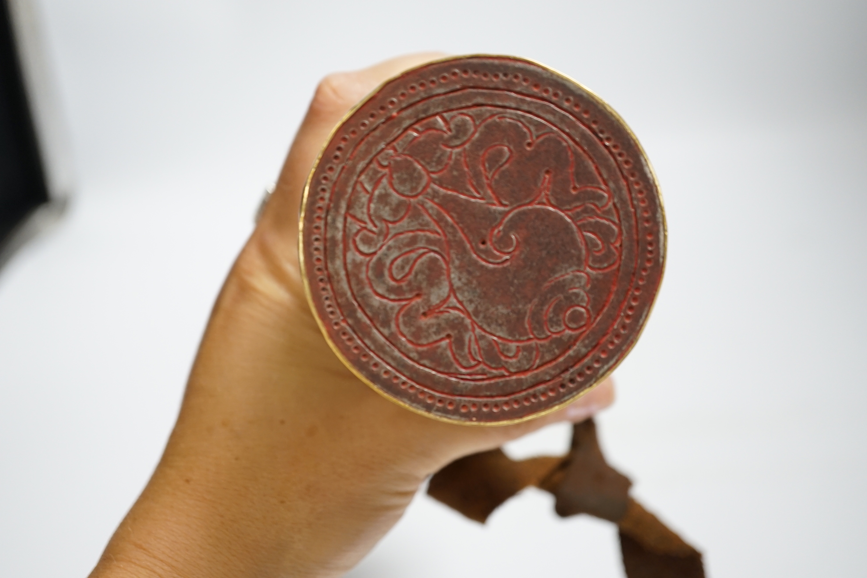 A large Tibetan repousse work seal, 19cm